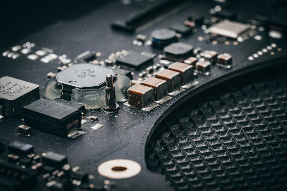 electric heated jacket technology - Detailed macro shot of an electronic circuit board showcasing various components.