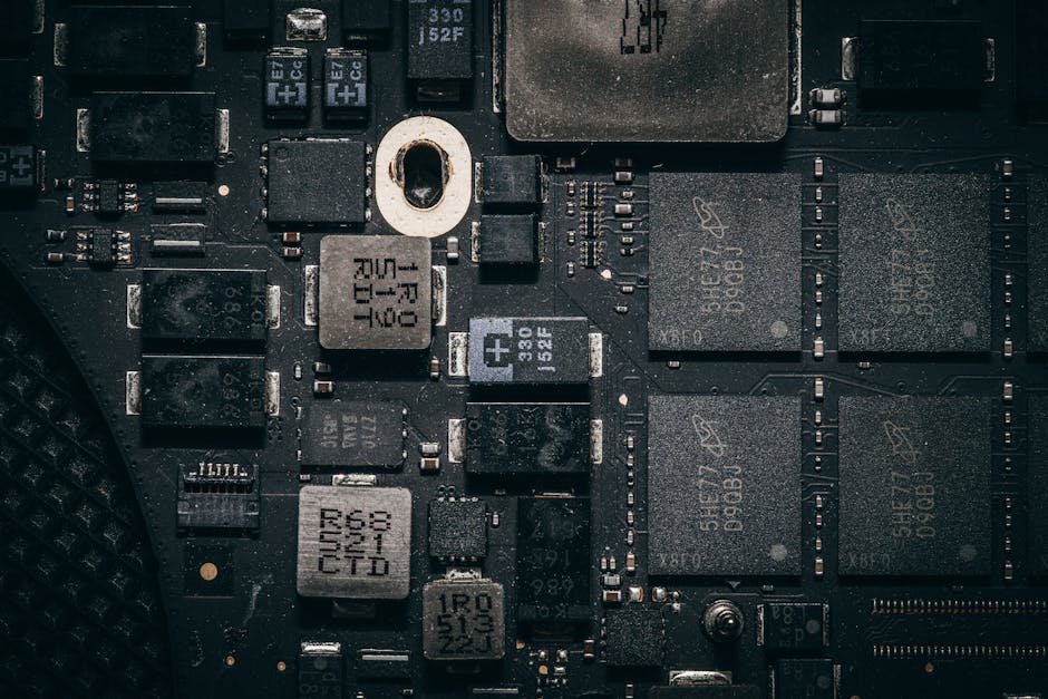 electric heated vest technology - Detailed close-up of a computer circuit board highlighting electronic components and intricate design.